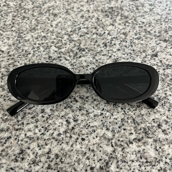 Black Oval Shaped Sunglasses - Picture 2 of 3